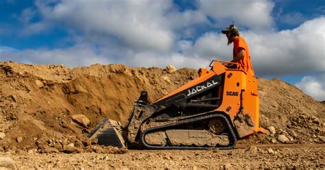 jackal mini skid steer|stand on mini skid steer.